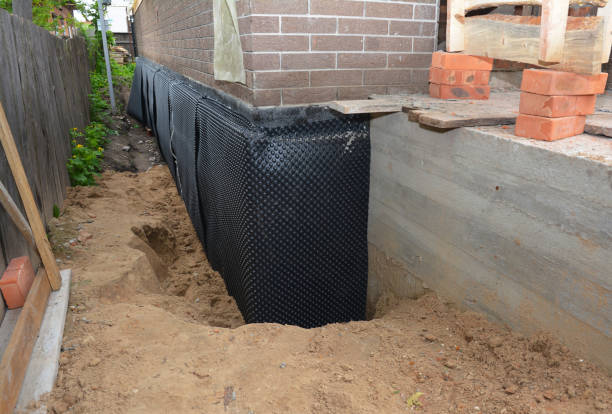 SJ Waterproofing Pros technician performing targeted Exterior Waterproofing assessment in Fayetteville, OH